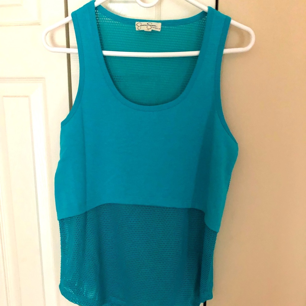 Mesh top with sold overlay